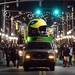 The Michigan side of a giant two-sided helmet float moves down 7th Ave. during the Outback Bowl New Year's eve parade in Ybor City, Fla. on Monday night. Melanie Maxwell I AnnArbor.com